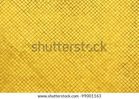 Golden tiled glasses mosaic background, Buddhist temple structure detail