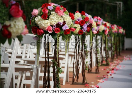 stock photo Beautiful wedding flower arrangement of seats along the aisle