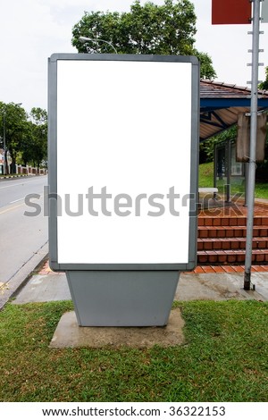 Blank billboard display at bus stop with clipping path for your advertising