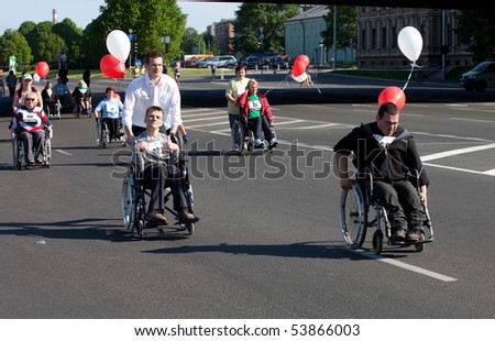 RIGA, LATVIA - MAY 23:  Disabled people participate in the Riga International Marathon in May 23, 2010, Riga, Latvia.