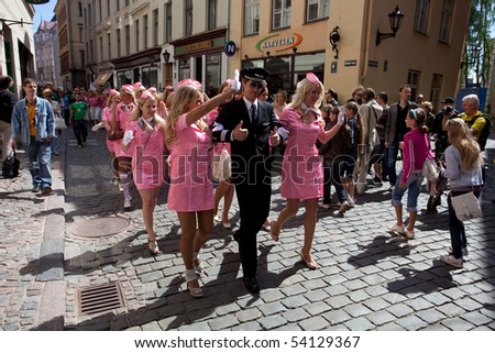 RIGA, LATVIA - MAY 29: The Latvian airline airBaltic team at Go Blonde parade Organized by the Latvian Association of Blonds in May 29, 2010, Riga.