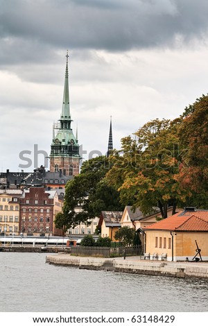 View of the old city and German Church sometimes called St. Gertrude\'s Church in Stockholm; Sweden. Early autumn.