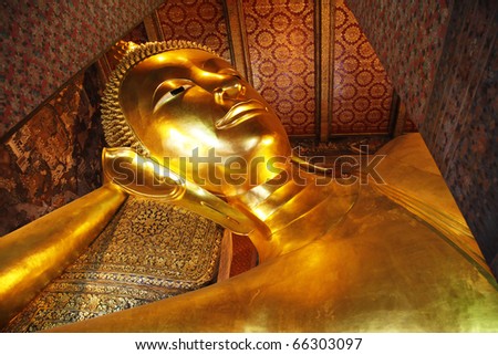 reclining buddha in Wat Po, Bangkok glittering with gold