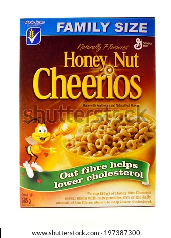 CALGARY, CANADA - MAY 24, 2014: A family sized box of Honey Nut Cheerios cereal. Introduced in 1979 by General Mills, an American corporation, it is now the best selling cereal in the United States.