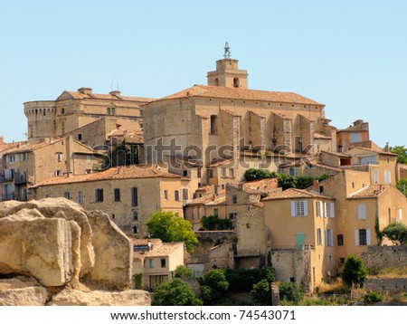 Castle and church in village of Gordes, Provence, France