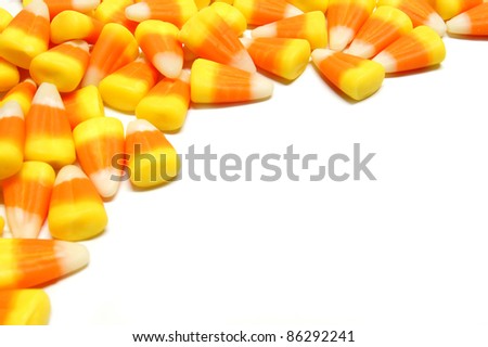 Halloween candy corn corner border over white