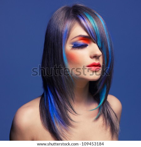 Photo of young lady with bright makeup on bright background