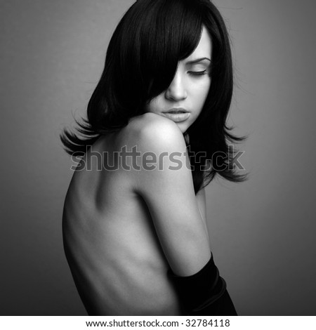 stock photo Elegant nude girl with magnificent black hair