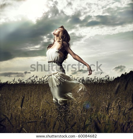 Portrait of jump women in wheat field