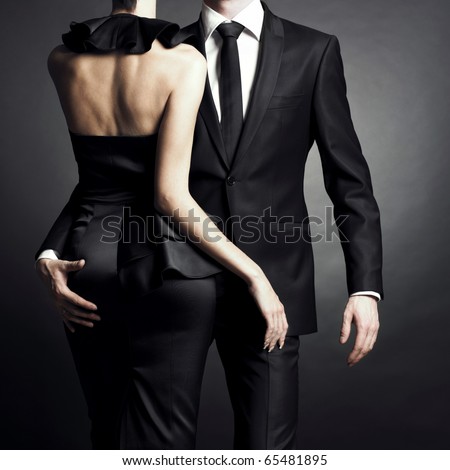 De ces couvertures qu'on voit double - Page 2 Stock-photo-conceptual-portrait-of-a-young-couple-in-elegant-evening-dresses-65481895