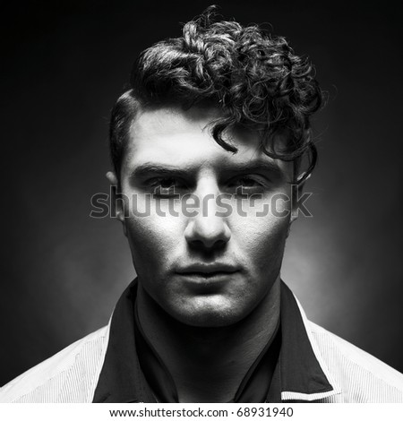 Portrait of a handsome stylish man with a cool hairstyle