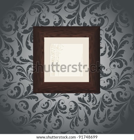 painting of bamboo branch in dark brown wooden frame on the wall