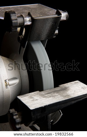 Bench grinder isolated on black