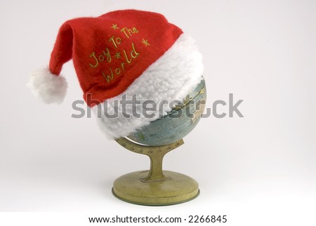 santa hat on globe joy to the world