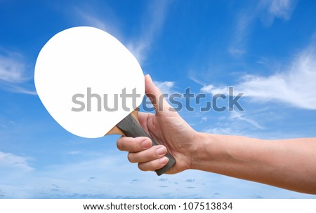 Hand hold Table tennis racket white screen over blue sky