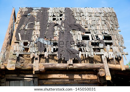 Dilapidated wooden leaky roof