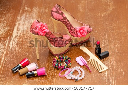 Women shoes pink. women\'s accessories. Stylized snake skin. Photo on vintage board
