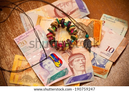 The national currency of Venezuela, Latin America. Souvenirs: pendants, handmade bracelet.