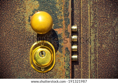 Door lock close up. Photo tinted yellow