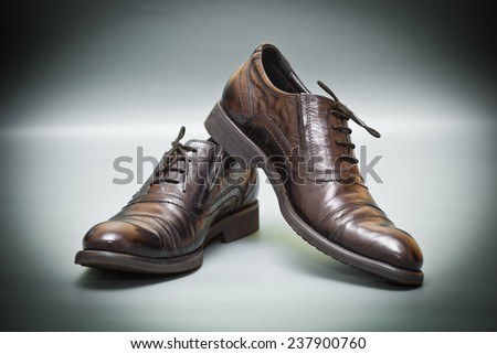 Fashion classic leather shoes on abstract background. fashion Trend