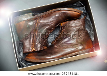 New fashion leather shoes brown vintage style in a box. Apply lighting effects