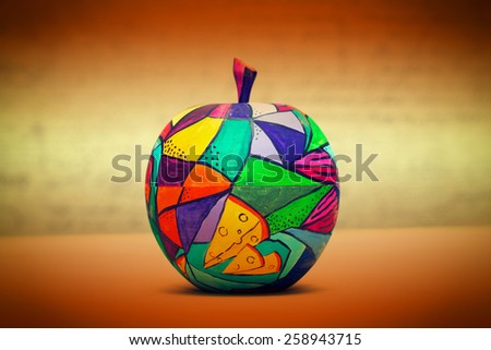 Decorative apple, made of wood and painted by hand paints. Handmade. Modern single-piece art