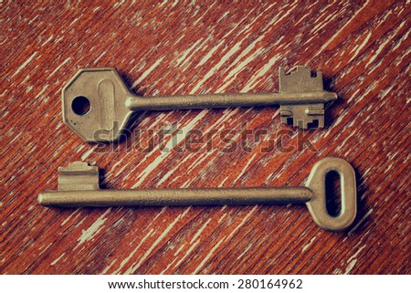 Vintage keys on a wooden table