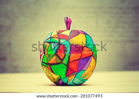 Decorative wooden apple, painted colors