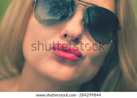 Woman gives a kiss