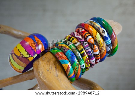 Plenty of colorful bracelets made of wood. Hand-painted in the style of Latin America