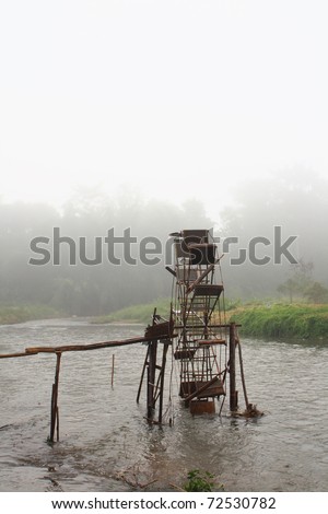 Bamboo water wheel. The use of water power for irrigation.Thailand