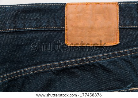 Blue Denim jeans with label used as a background