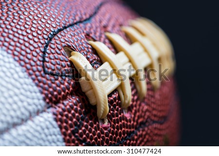 Leather American Football on Black background