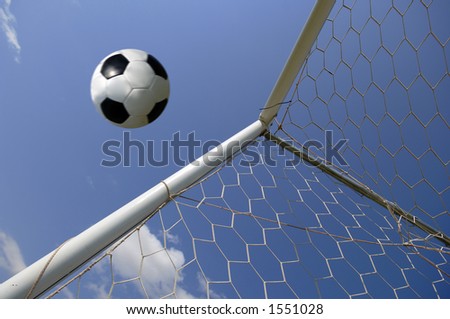 الغزل ..بلغة اصحاب المهن Stock-photo-football-soccer-ball-in-goal-against-blue-sky-1551028