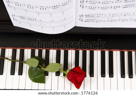 Sheet music with rose piano