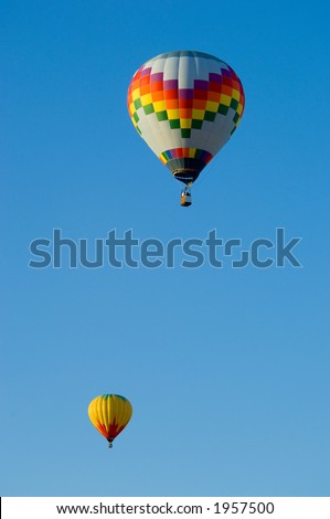 Beautiful hot air balloons against dark blue sky with basket