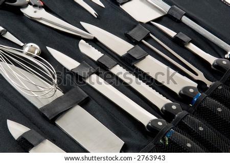 Professional chefs, cooks knife set in black case on white background