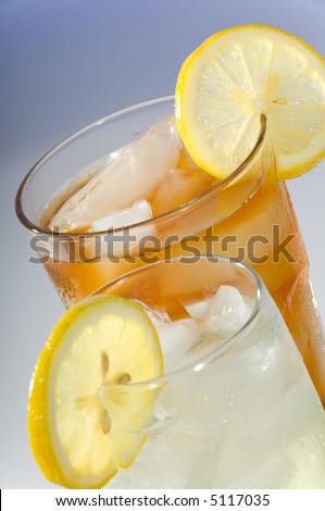 Summertime drinks including iced tea and lemonade with a lemon slice