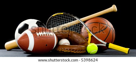 A variety of sports equipment on a black background including an american football, a soccer ball, a baseball, a baseball bat, a tennis racket, a tennis ball, and a basketball