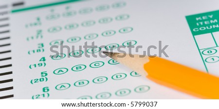 Yellow Pencils lying on a computerized exam answer sheet