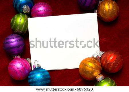 Blank note-card with assorted color Christmas balls, great for invitation, gift tag or Christmas card background, with copy space