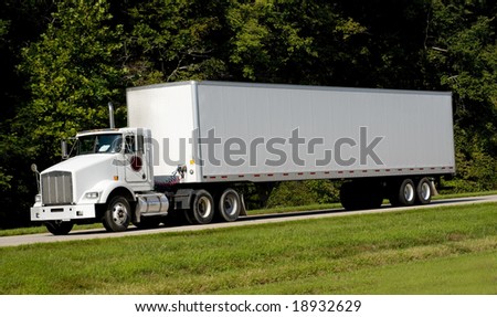 A 18-wheel truck on a highway