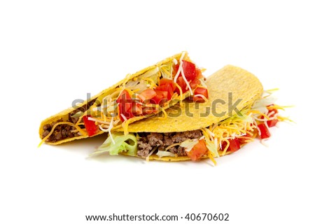 Two tacos on a white background with tomatoes, beef, lettuce and cheese- mexican food