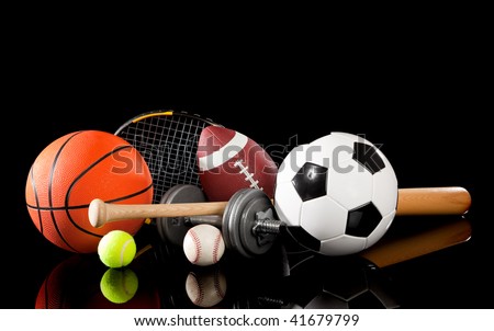 Assorted sports equipment including a basketball, soccer ball, tennis ball, baseball, bat, tennis racket, football and dumbbells on a black background