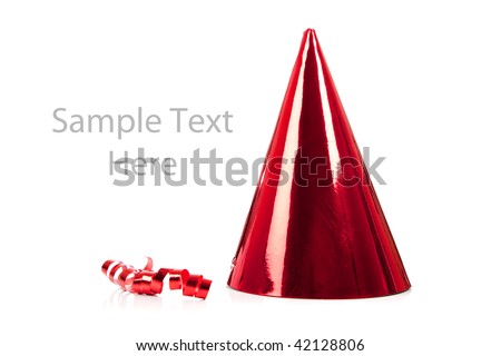 a red party hat and streamer on a white background with copy space