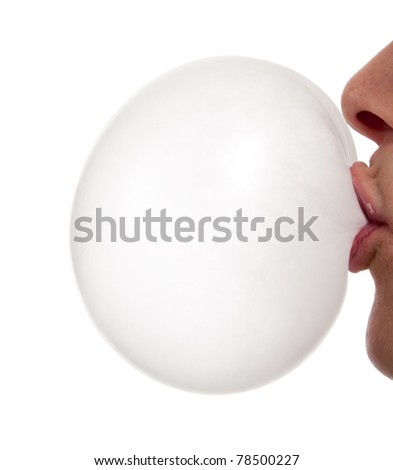 A closeup of of a person blowing a bubble with copy space