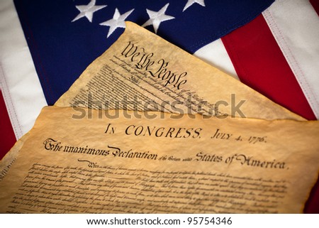 the United States Constitution and Declaration of Independence on a Betsy Ross Flag background
