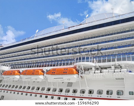 Side view of cruise ship on the blue sky background
