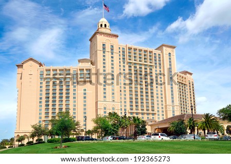 Orlando, Florida, USA - April 22, 2014: The JW Marriott Orlando hotel is part of the gorgeous Grande Lakes luxury complex including a dozen or so restaurants, convention center and golf course.