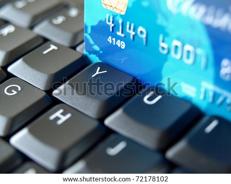 Credit card on computer keyboard.